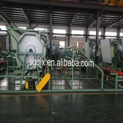 Máquina de adherencia de materiales textiles para la producción de tejidos textiles