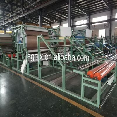 Máquina de adherencia de materiales textiles para la producción de tejidos textiles